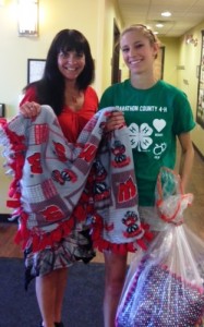 Allison Brunner from the 4-H Rib Mountaineers donating hand-made blankets