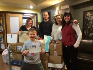 Donation of Wish List items by Rothschild Elementary, with representative Eli Irwin