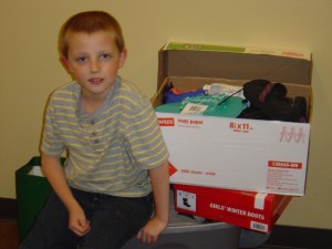 Instead of presents for his birthday, Owen Fritz asked for shoes he could give to The Women’s Community