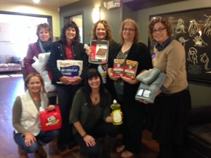 Liberty Mutual staff with donation of household items