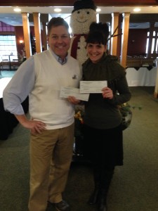 Scott Sann of Greenwood Hills Country Club presenting checks from their Make A Difference Monday fundraisers