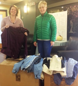 Sheppard & Schaller donated boxes of new coats