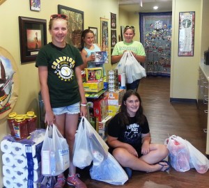 Girl Scout Troop 7331 shopping with extra cookie sales money